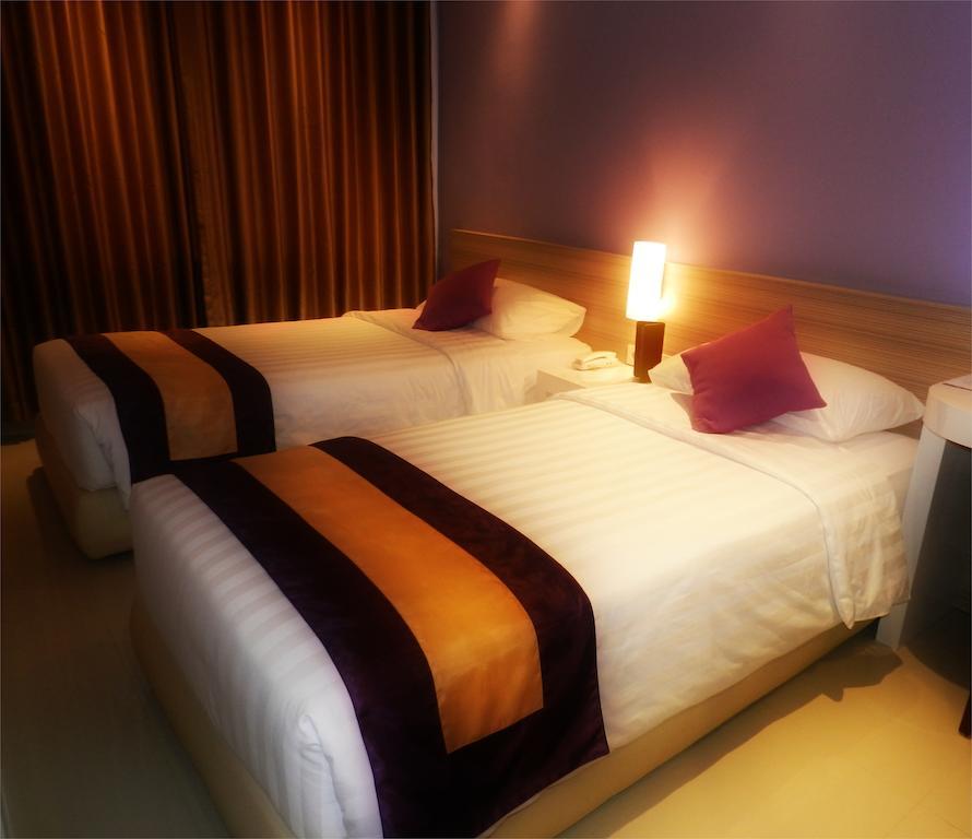 Salis Hotel Бандунг Стая снимка